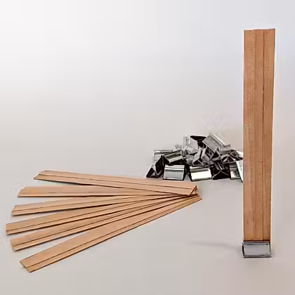 several pieces of wood are sitting on top of each other