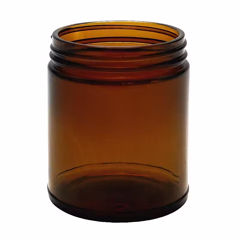 a brown glass jar on a white background