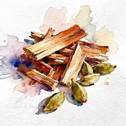 Chips of woods beside five green cardamom seed