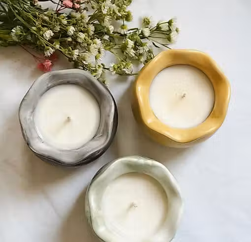 3 bougies en contenant vue de dessus