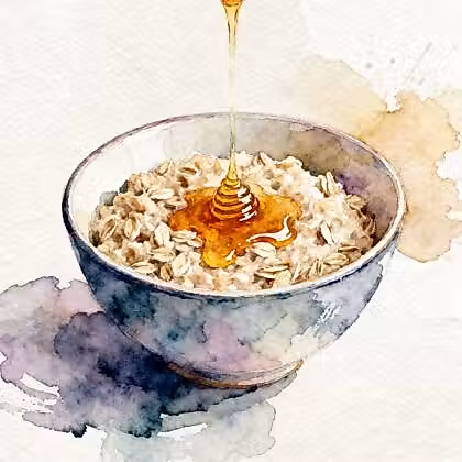 A bowl of oatmeal and honey